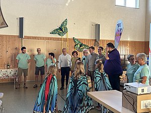 Die Initiative „Schmetterlingsdorf Dörscheid“ präsentierte gemeinsam mit der BUGA 2029 gGmbH ihr Konzept – unterstützt von kleinen Botschafterinnen mit Schmetterlingsflügeln.